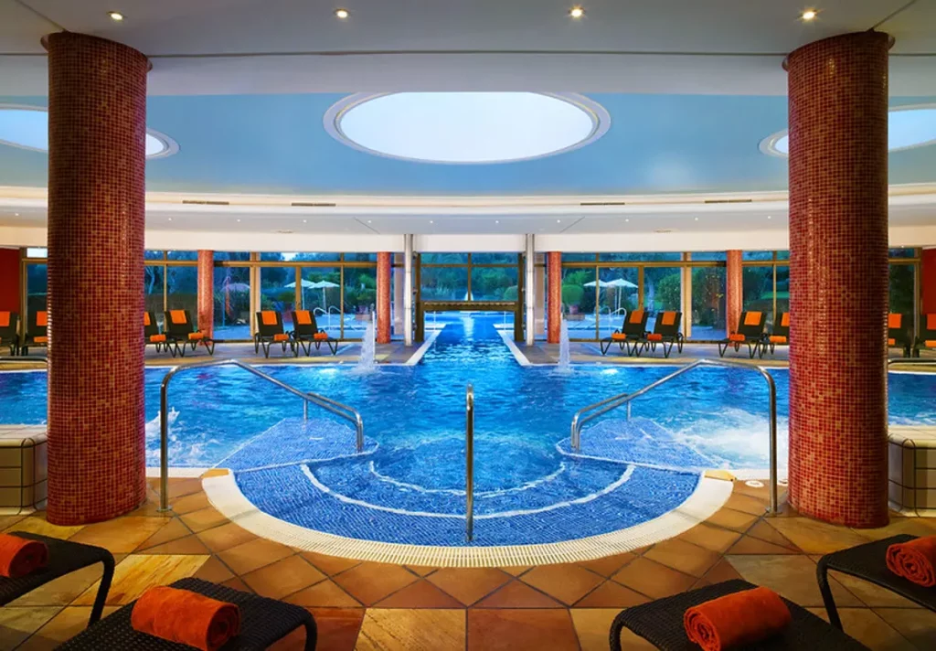 Indoor pool with jets at Son Antem Spa
