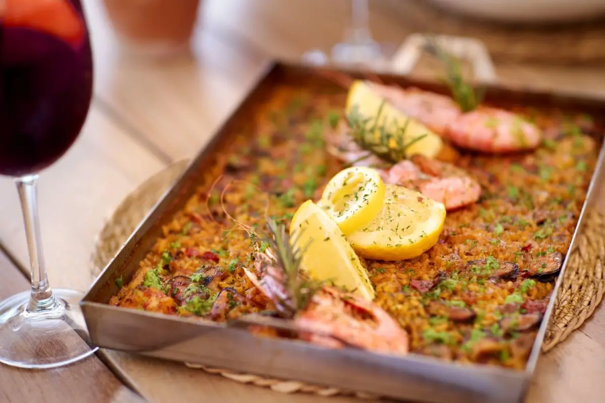 Delicious paella with shrimp and lemon at Son Antem Golf Mallorca La Terrassa Restaurant